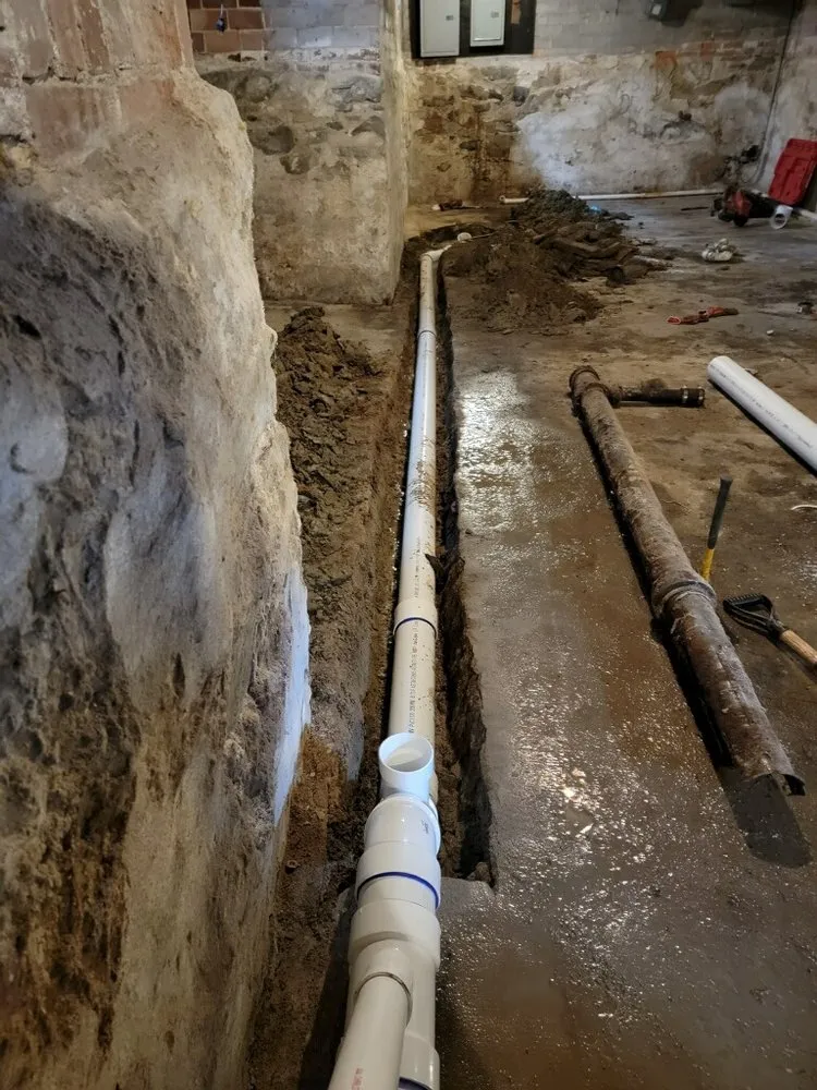 Slide of AT Plumbing Services