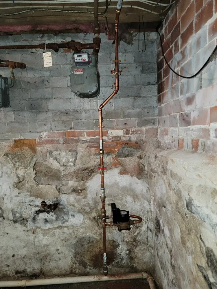 Slide of AT Plumbing Services