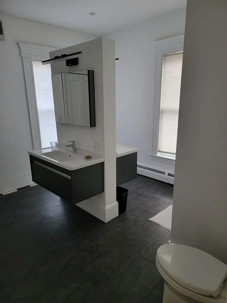 Slide of AT Plumbing Services