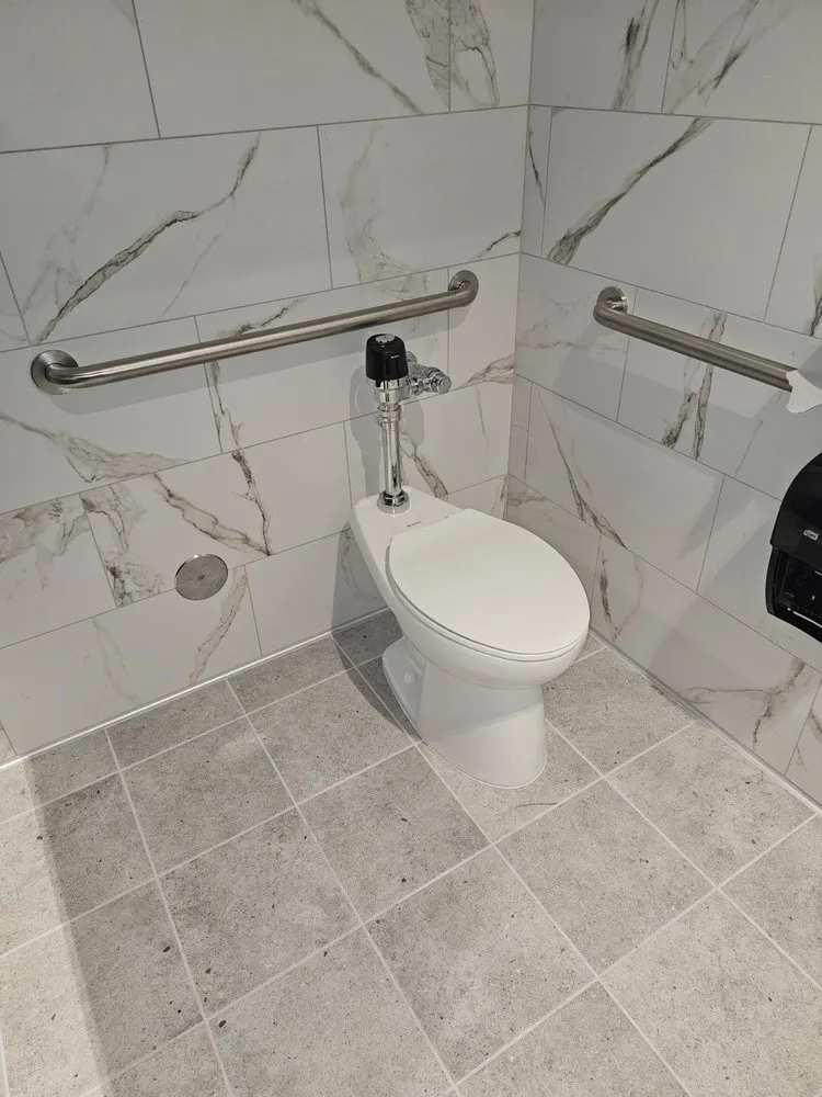 Slide of At Your Service Plumbing