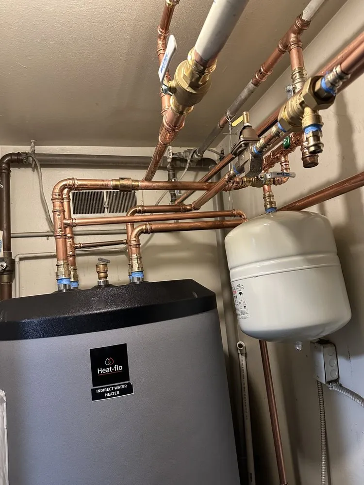 Slide of At Your Service Plumbing