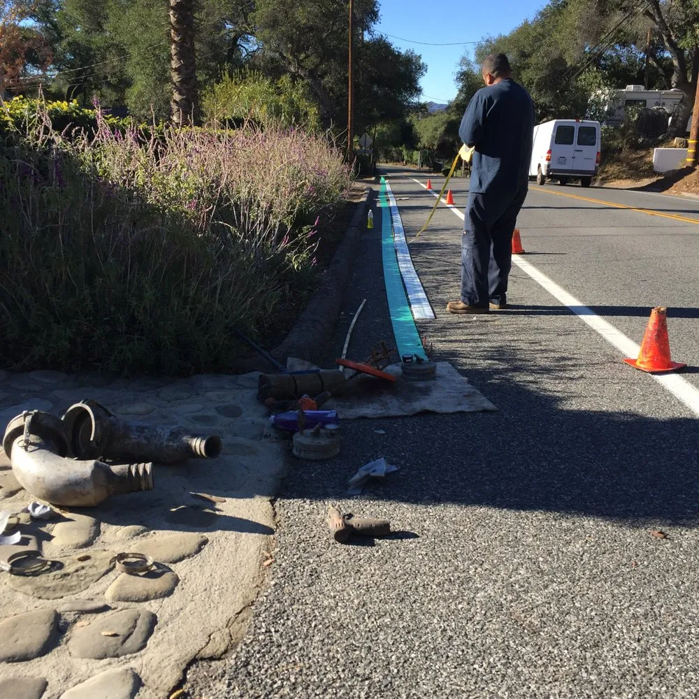 Slide of ATM Plumbing and Rooter