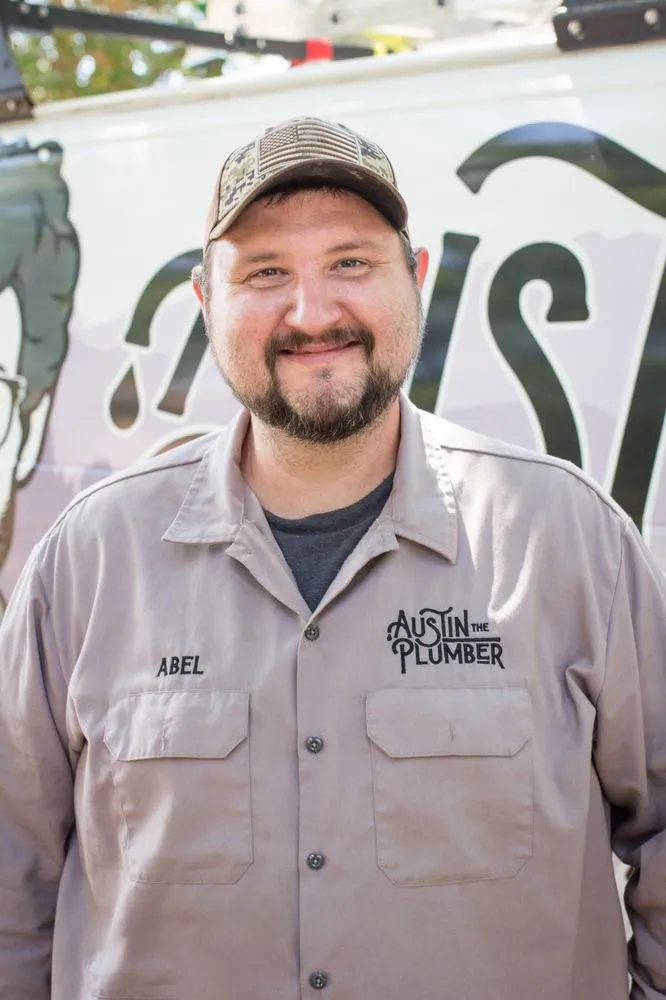 Slide of Austin the Plumber