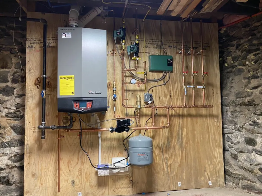 Slide of B Hadley plumbing and heating