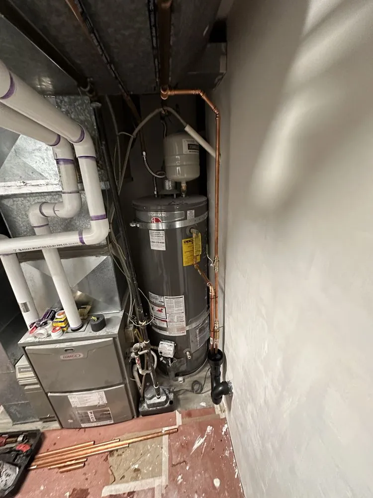 Slide of B Hughes Plumbing Service