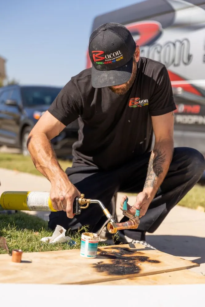 Slide of Bacon Plumbing Heating Air Electric