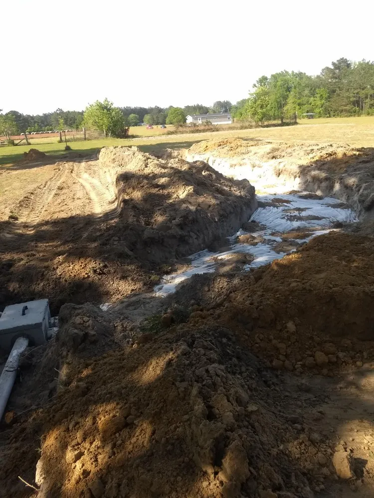 Slide of Baker Backhoe Enterprise