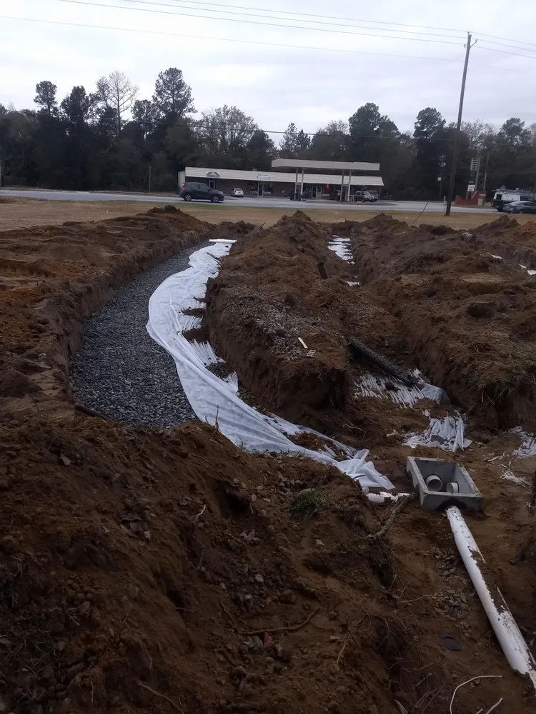 Slide of Baker Backhoe Enterprise