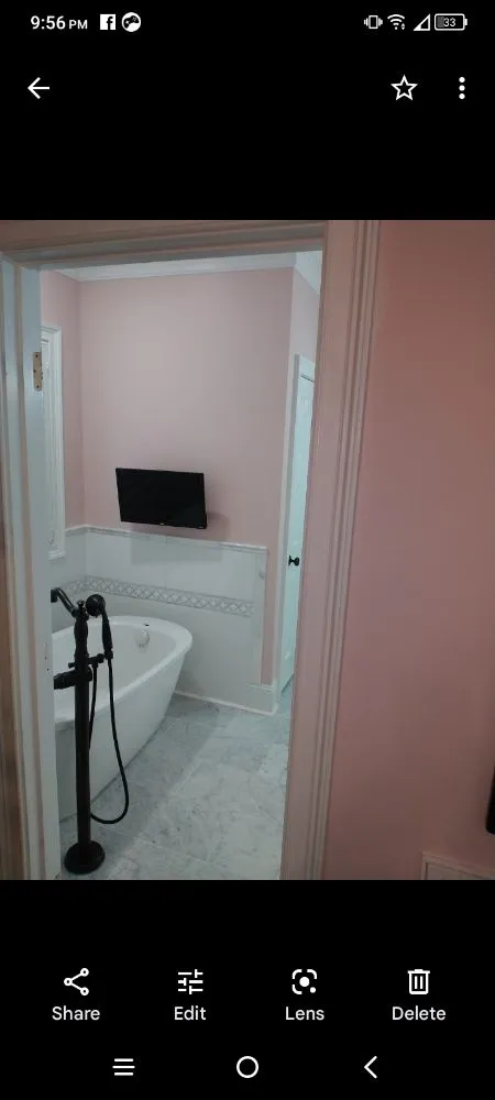 Slide of Bathmatic Custom Tile and Shower