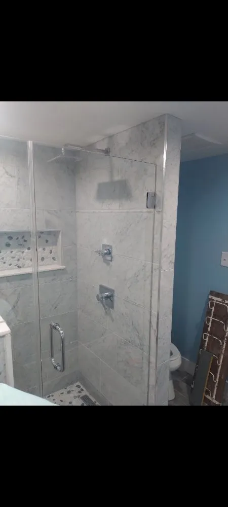 Slide of Bathmatic Custom Tile and Shower