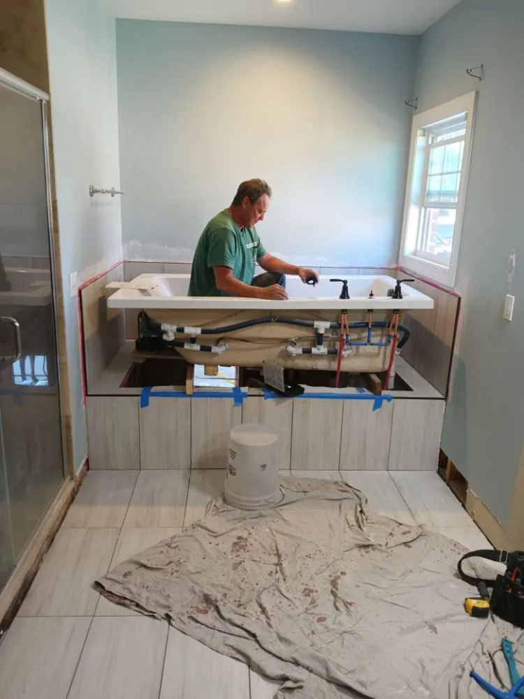 Slide of Bathmatic Custom Tile and Shower