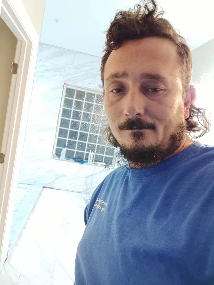 Slide of Bathmatic Custom Tile and Shower