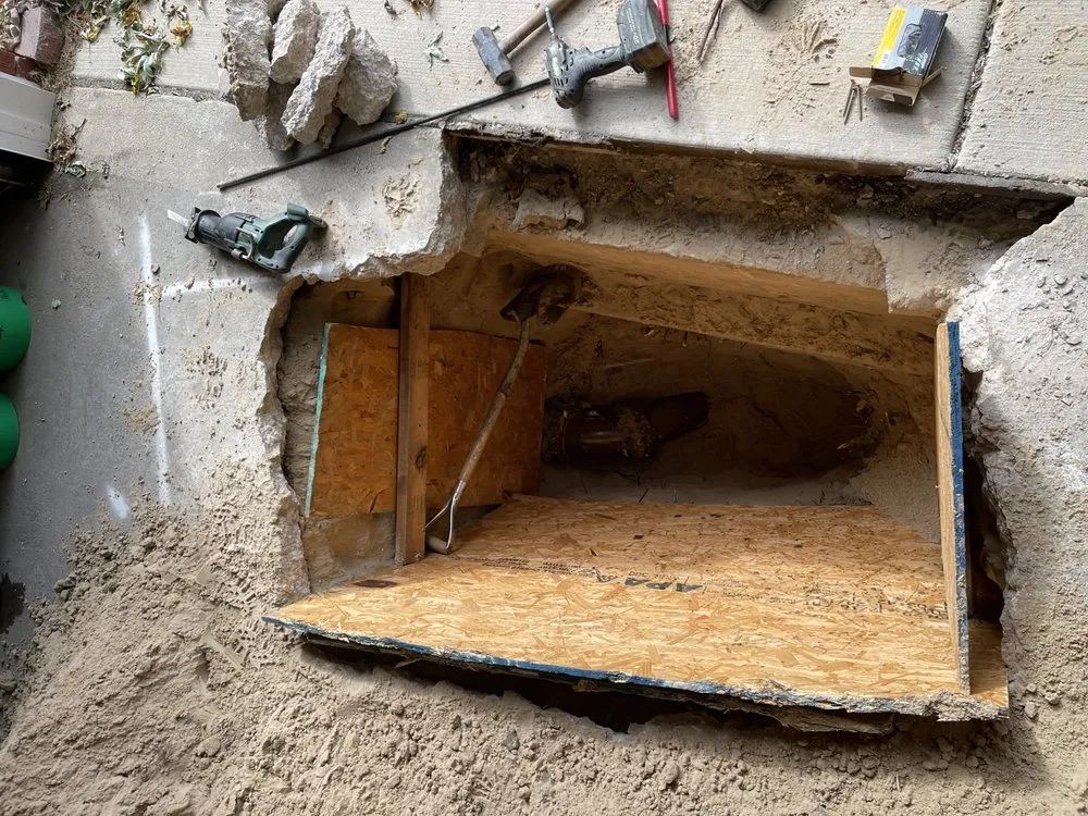 Slide of Benchmark Plumbing & Rodding