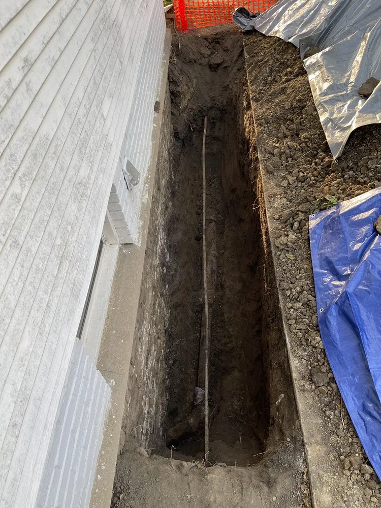 Slide of Benchmark Plumbing & Rodding