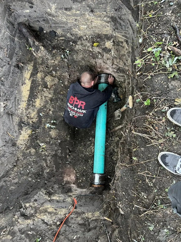 Slide of Benchmark Plumbing & Rodding