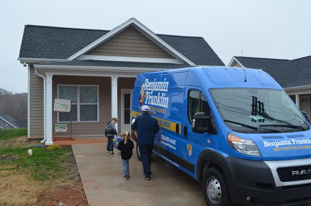 Slide of Benjamin Franklin Plumbing Of The Triad