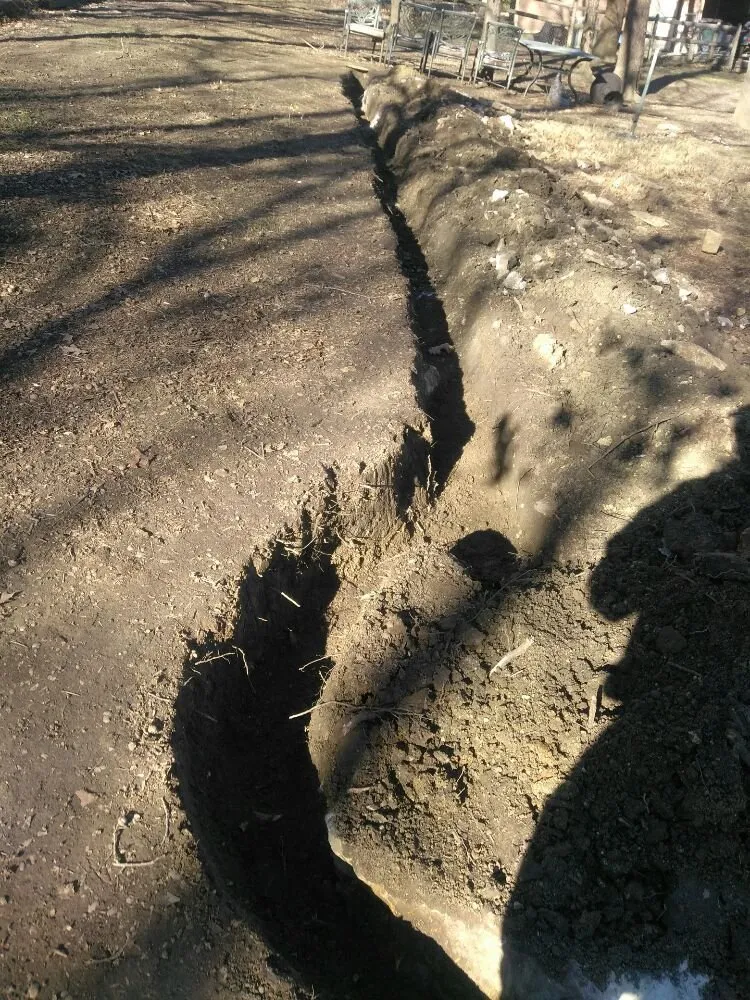 Slide of Benson's Drainage Solutions