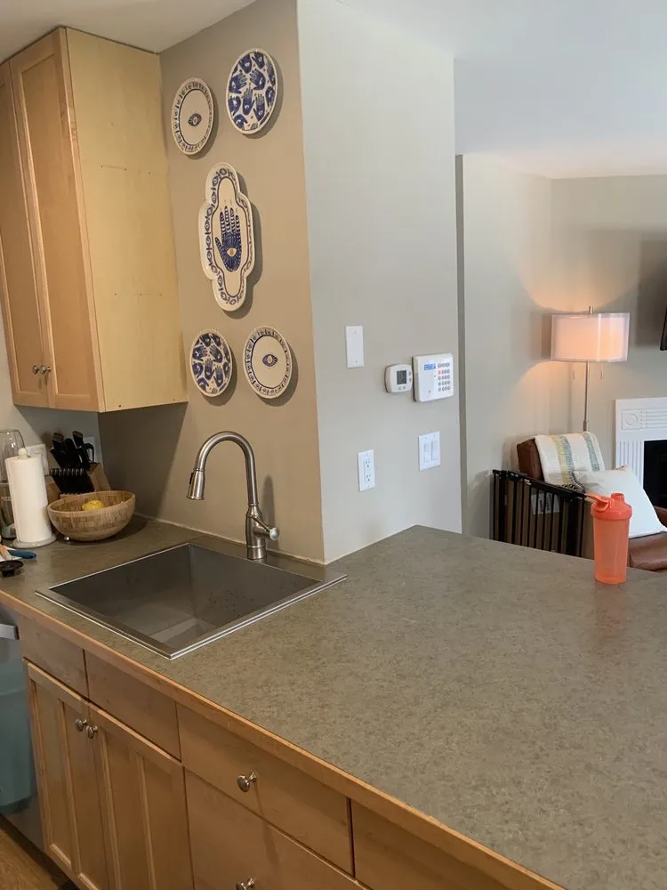 Slide of Big Apple Plumbing