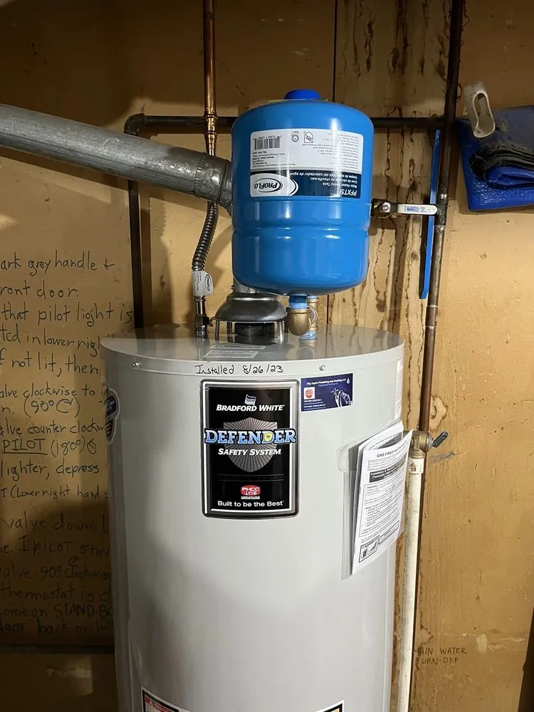 Slide of Big Apple Plumbing