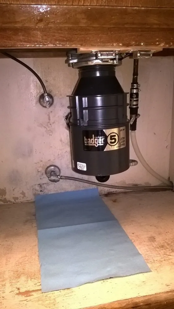 Slide of Big Brothers Plumbing