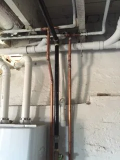 Slide of Big Brothers Plumbing