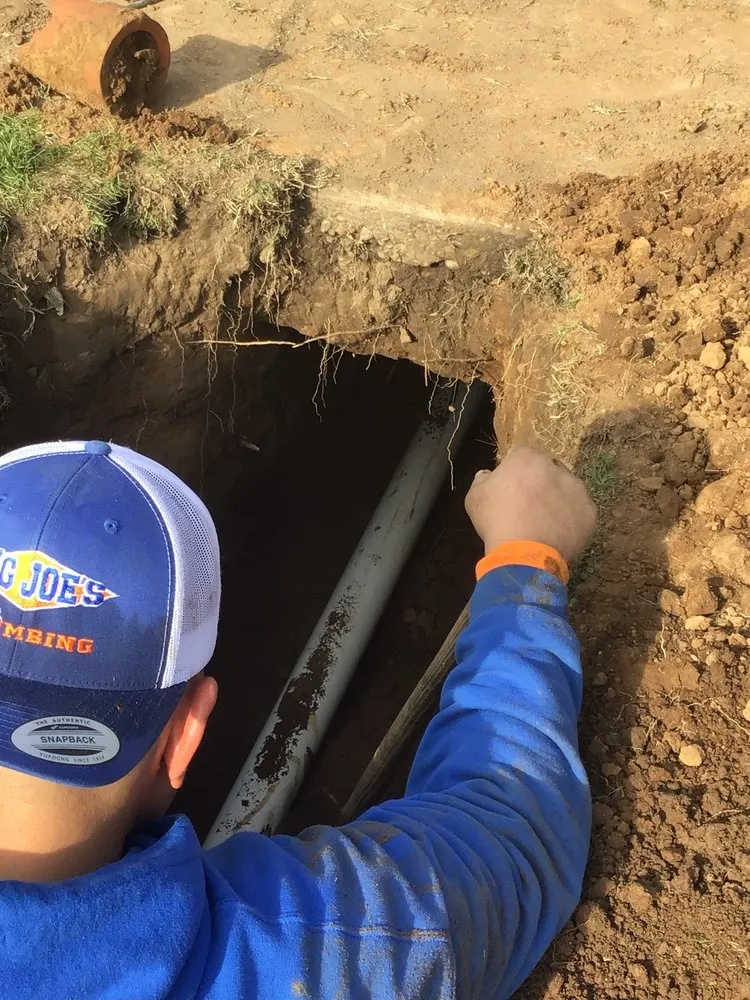 Slide of Big Joe's Plumbing