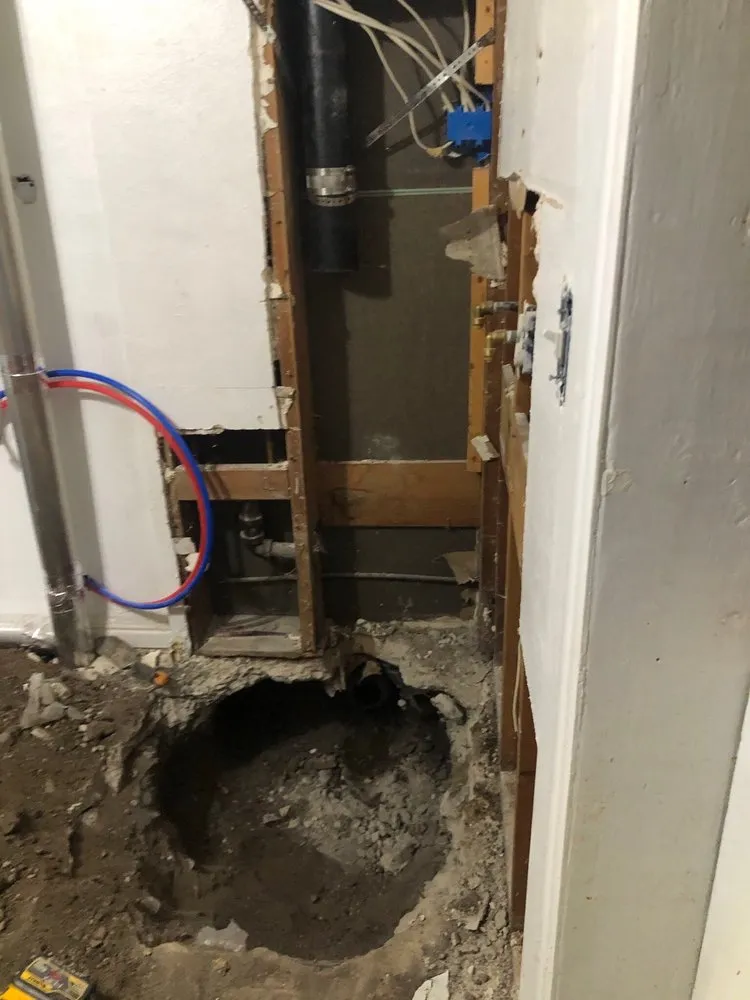 Slide of Big Johns Plumbing