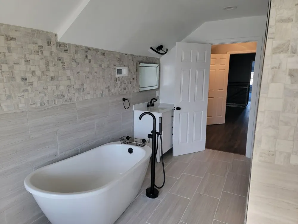 Slide of Big Time Builders Handyman Service's