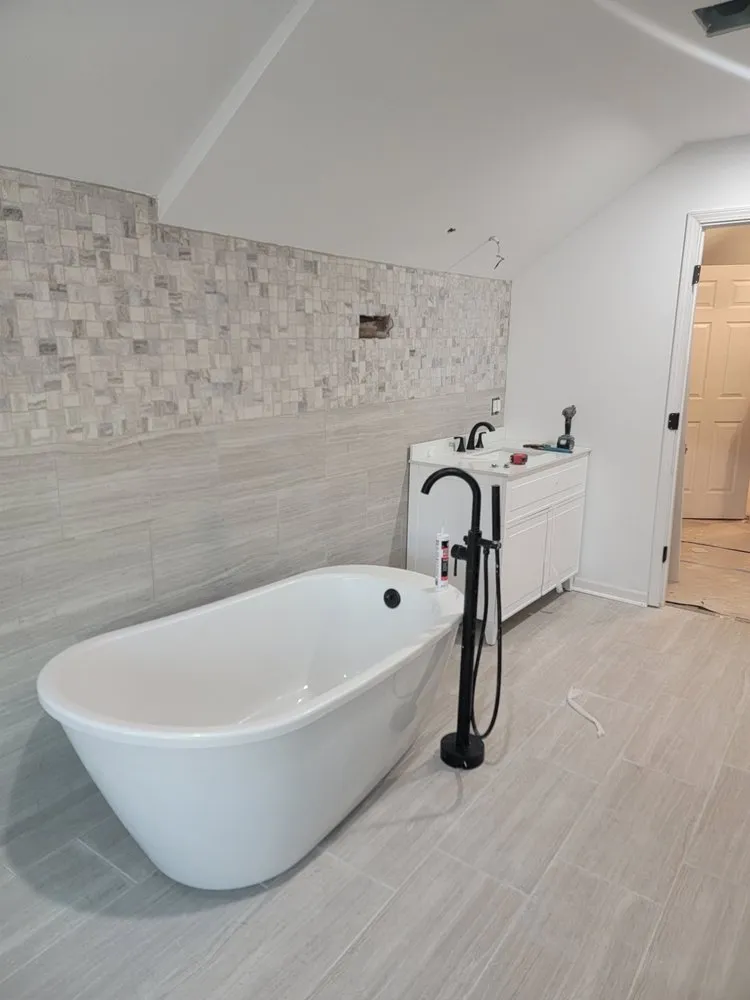 Slide of Big Time Builders Handyman Service's