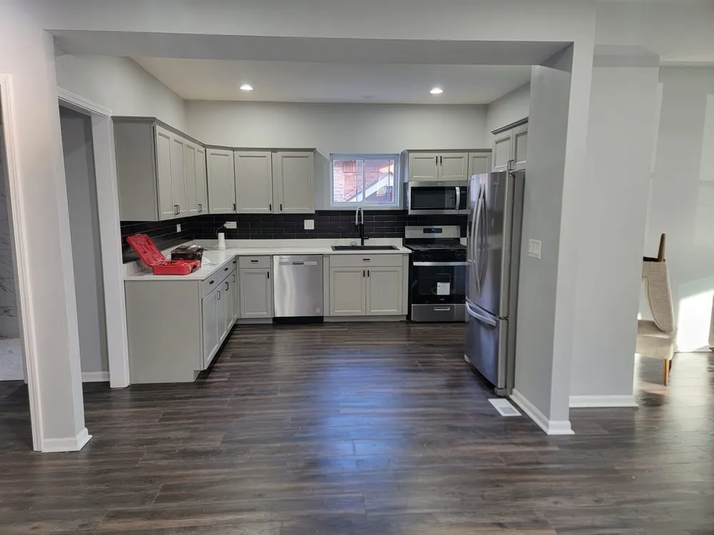 Slide of Big Time Builders Handyman Service's