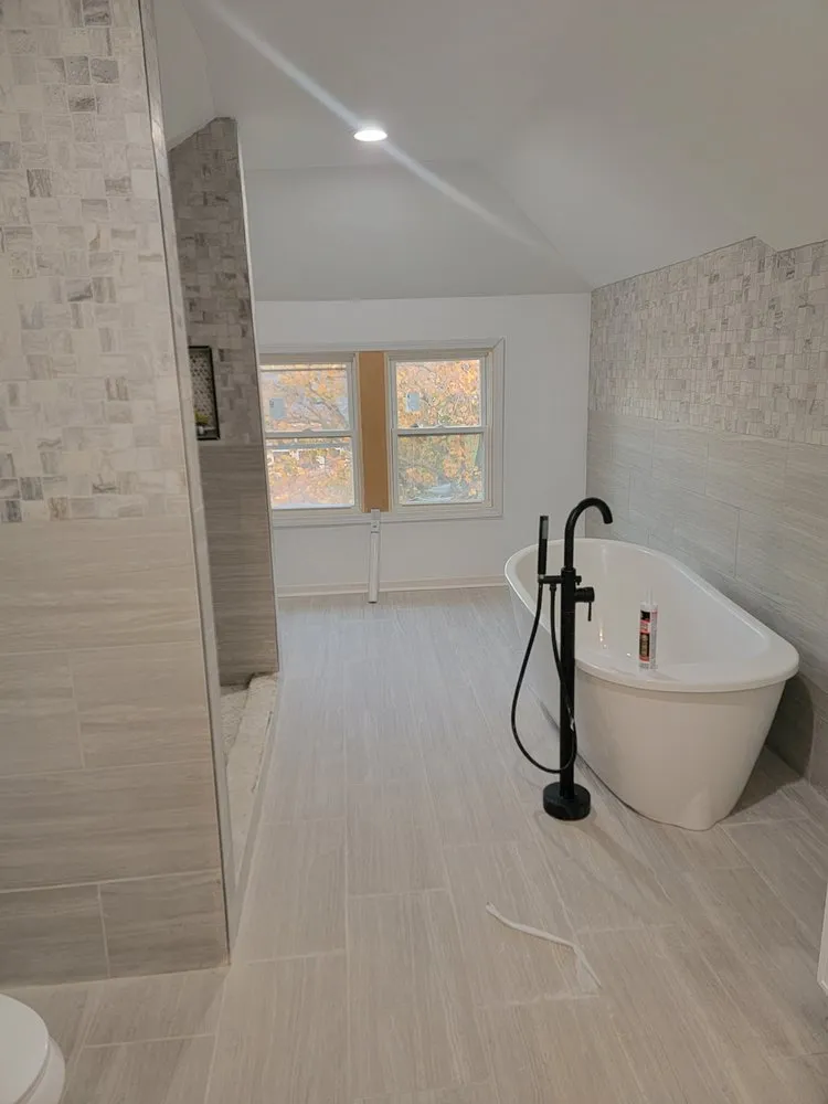 Slide of Big Time Builders Handyman Service's