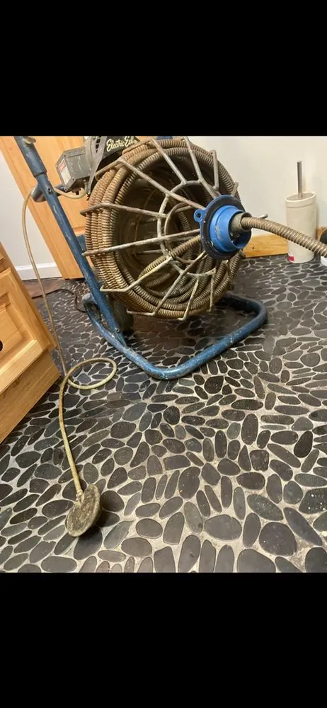 Slide of Black  Pressure Washing & Plumbing Services