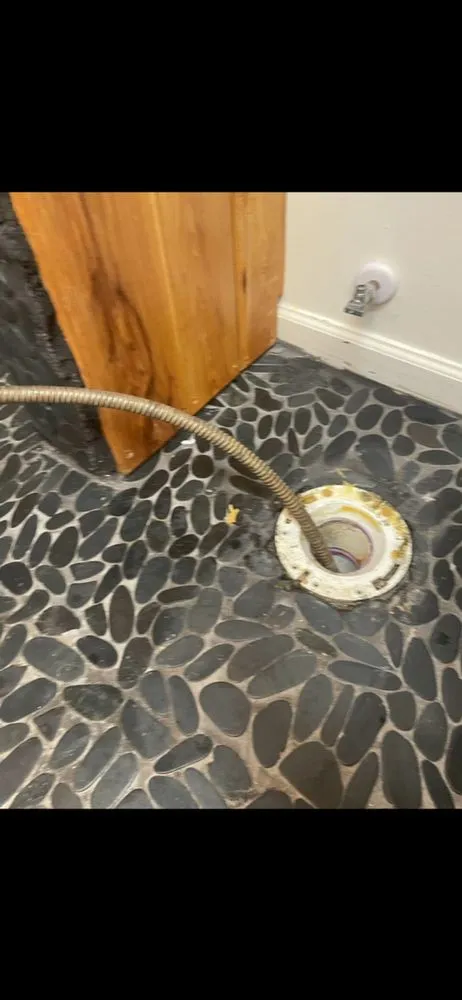 Slide of Black  Pressure Washing & Plumbing Services