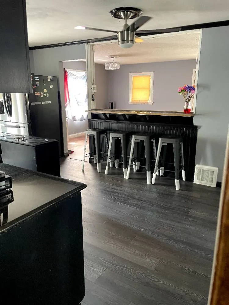 Slide of Black Brothers Flooring and More