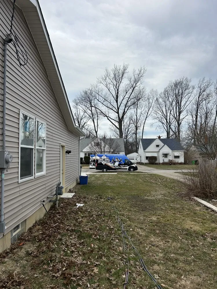 Slide of Black Diamond Drain Service