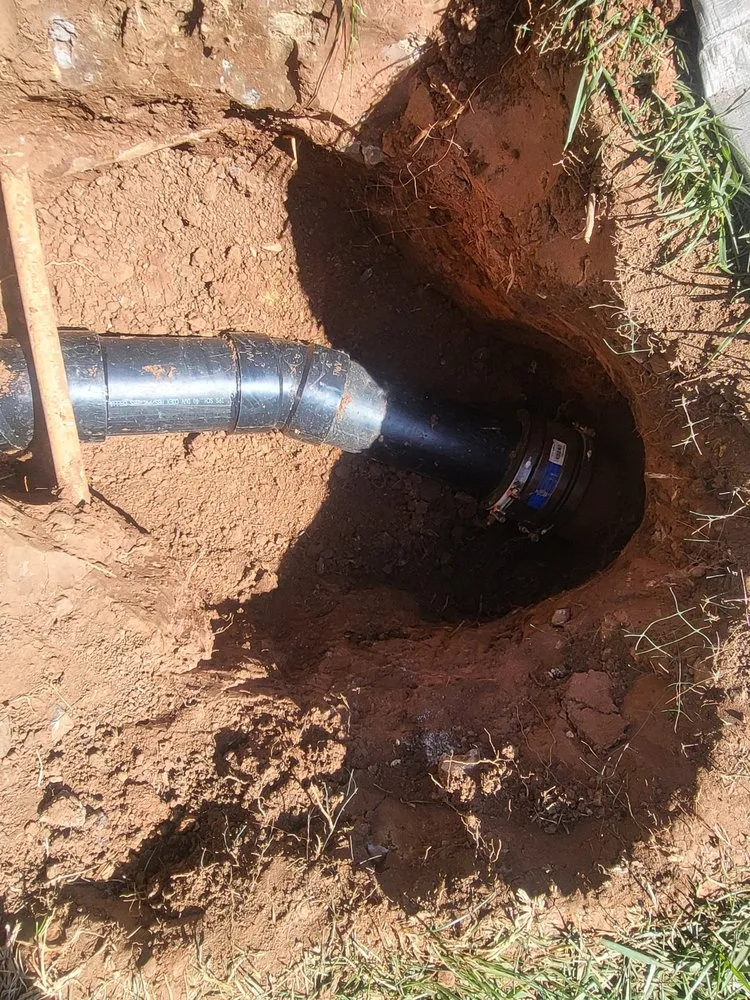 Slide of Black Diamond rooter and plumbing