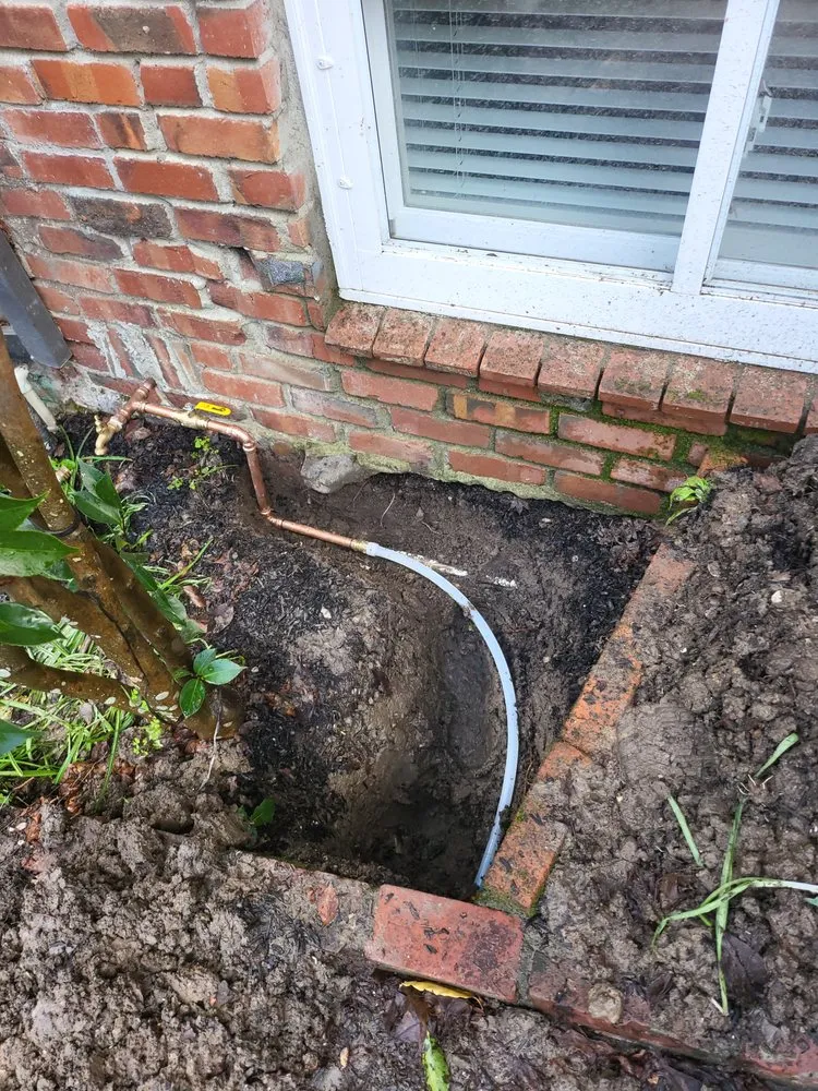 Slide of Black Diamond rooter and plumbing