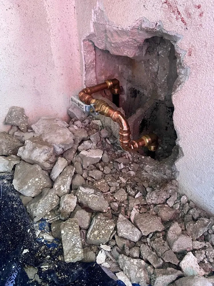 Slide of Black Pipes Plumbing