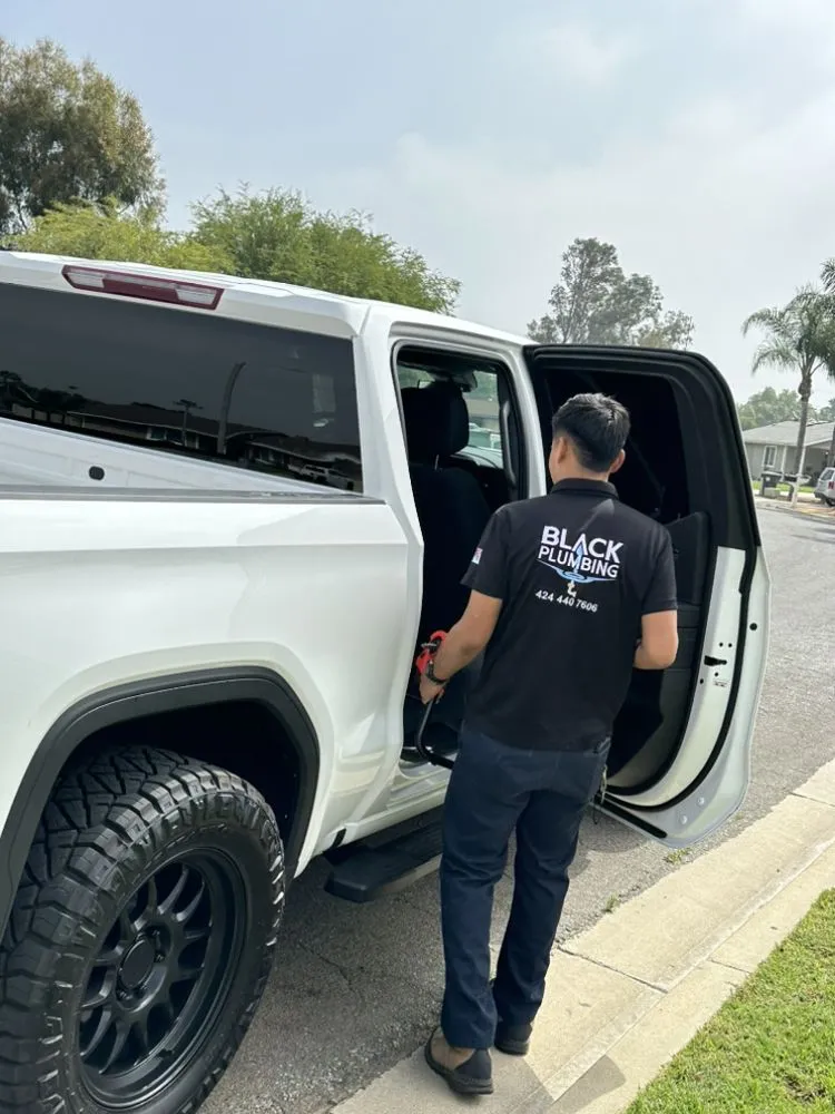 Slide of Black Plumbing