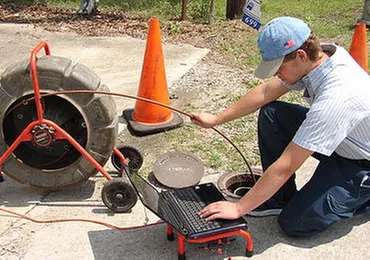 Slide of Blue Flash Drain & Sewer Cleaning