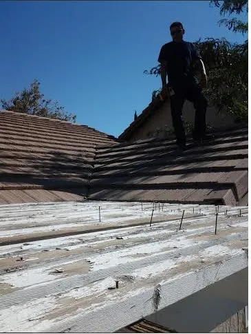 Slide of Blue Shirt Handyman