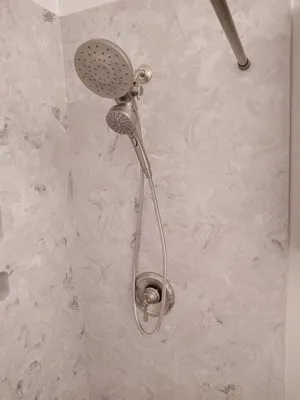 By Design Construction & Plumbing Logo