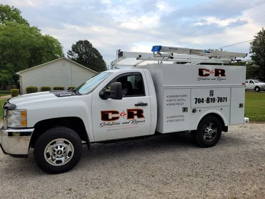 C & R Solutions & Repair Logo