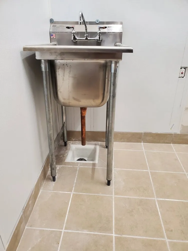 Slide of Calzini's Plumbing