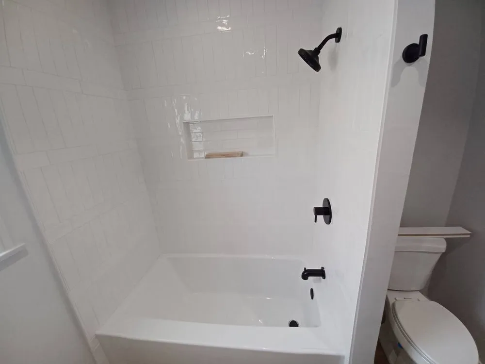 Slide of Camelot Plumbing & Handyman Service