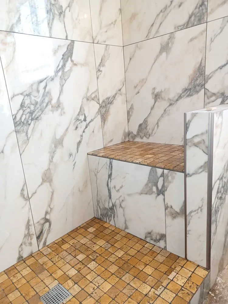 Slide of Camelot Plumbing & Handyman Service