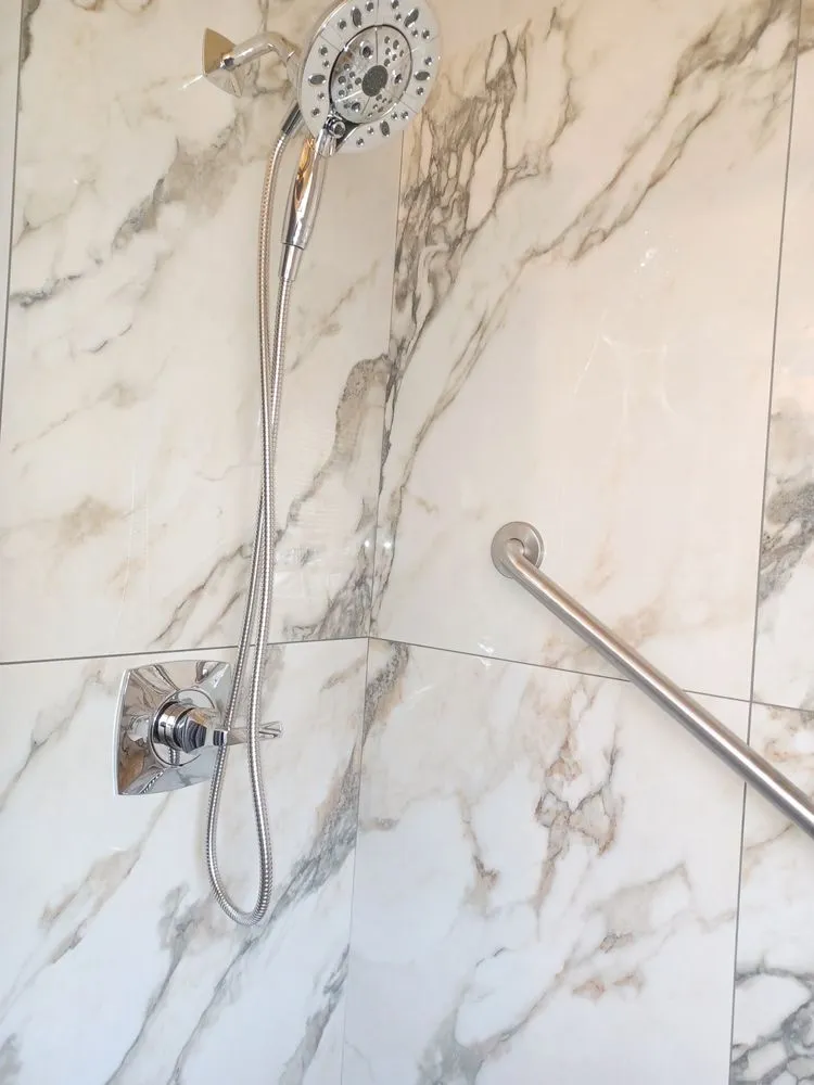 Slide of Camelot Plumbing & Handyman Service