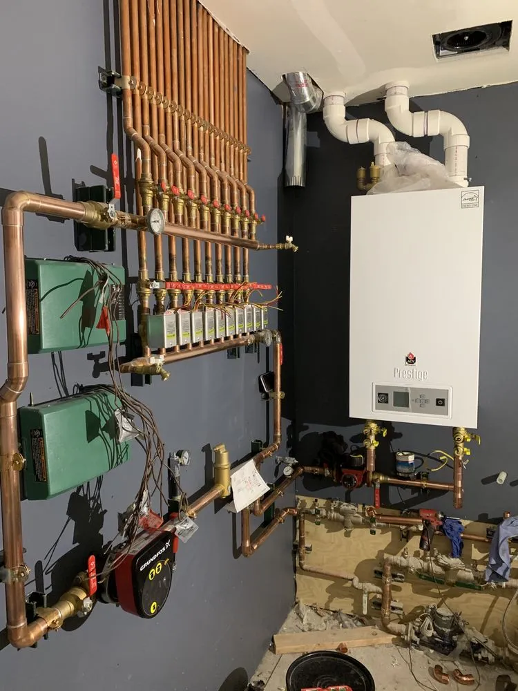 Slide of Carlos' Plumbing and Heating