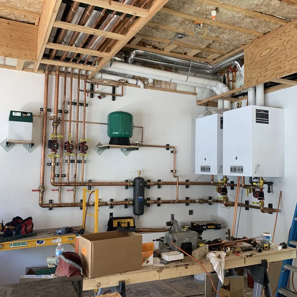 Slide of Carlos' Plumbing and Heating