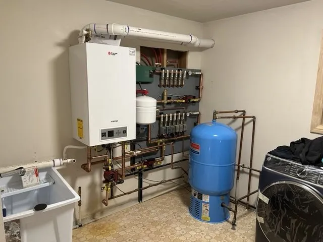 Slide of Carlos' Plumbing and Heating